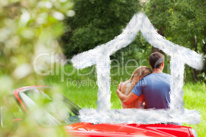 Composite image of loving couple admiring nature while leaning o