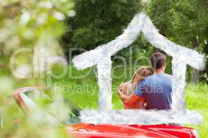 Composite image of loving couple admiring nature while leaning o