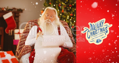 Composite image of relaxed santa writing list with a quill