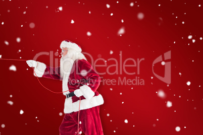 Composite image of santa pulls something with a rope