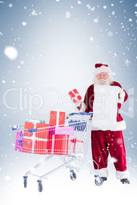 Santa spread presents with shopping cart