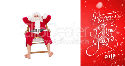 Composite image of happy santa relaxing on deckchair