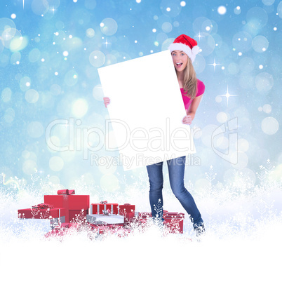 Festive blonde holding large poster Festive blonde holding large poster