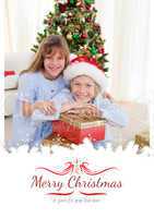 Composite image of happy brother and sister holding christmas pr