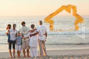 Composite image of beautiful family at the beach