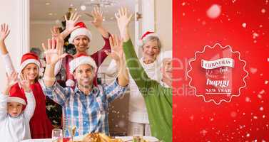 Composite image of happy extended family in santa hat cheering a