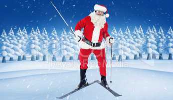 Composite image of portrait of happy santa claus skiing