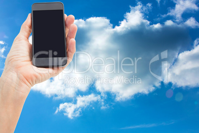 Composite image of woman showing black smartphone screen