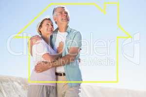 Composite image of happy senior couple embracing on the pier