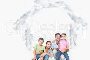 Composite image of cute family posing and smiling at camera toge