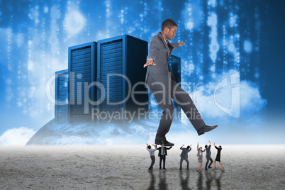 Composite image of business people supporting boss