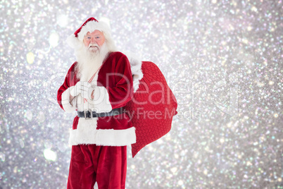 Composite image of santa carries his red bag