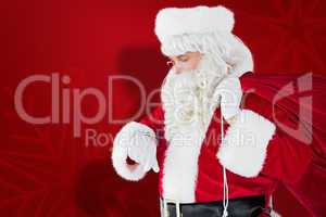 Composite image of festive santa claus checking time