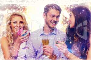 Composite image of friends toasting