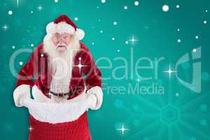 Composite image of santa open his red bag