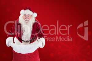 Composite image of santa open his red bag