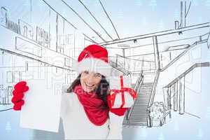 Composite image of festive brunette holding gift and showing pap