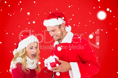 Composite image of young festive couple