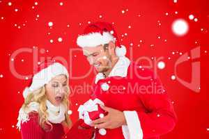 Composite image of young festive couple