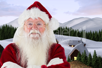 Composite image of santa smiles with folded arms