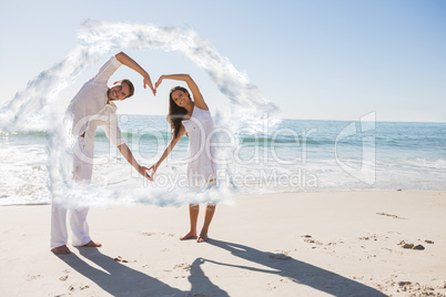 Composite image of loving couple forming heart shape with arms