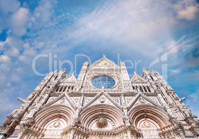 Siena Cathedral against sunset sky, Italy