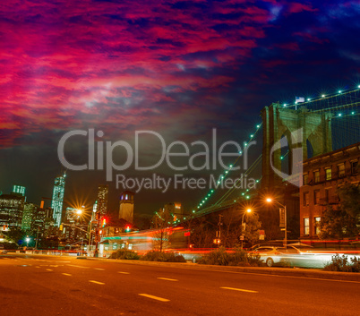 Traffic in Brooklyn at dusk. View of Bridge and Lower Manhattan