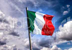 Italian three colors flag of Italy on the sunset sky background