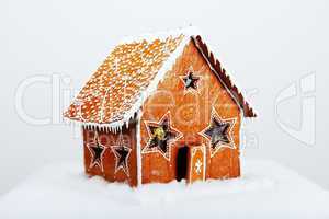 The hand-made eatable gingerbread house and snow decoration