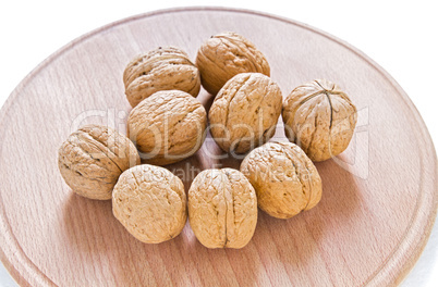 Walnuts on rustic  wooden table