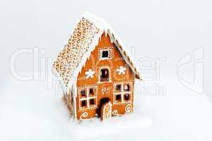 The hand-made eatable gingerbread house and snow decoration