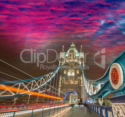 Traffic car lights across Tower Bridge under a beautiful sunset