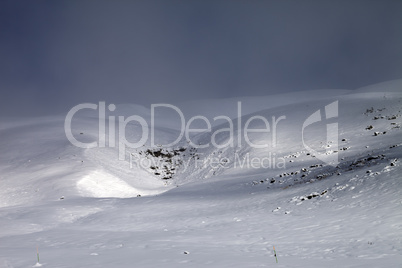 View on off-piste slope in bad weather