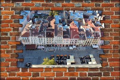 brick wall and view to the house-tops in Lvov city