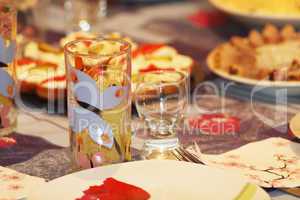 crockery glass plate and wine-glass on the served table