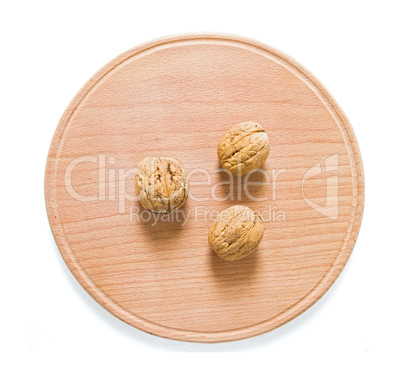 Walnuts on rustic  wooden table