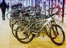 VIENNA - FEBRUARY 2, 2010: Bikes parked in city center. Going by