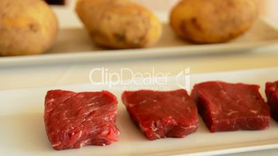 Pieces of red beef or veal and salt ingredients pan