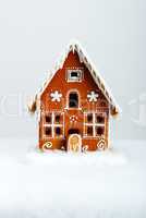 The hand-made eatable gingerbread house and snow decoration