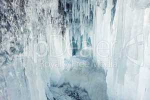 Icy frozen splash on a ice wall