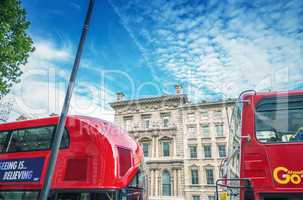 LONDON - SEPTEMBER 28, 2013: Modern red double decker buses in L