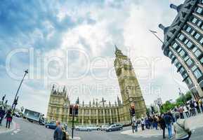 LONDON - SEPTEMBER 27, 2013: Tourists walk near Westminster Pala