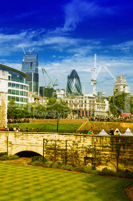 Gardens of Tower of London with city skyline on background