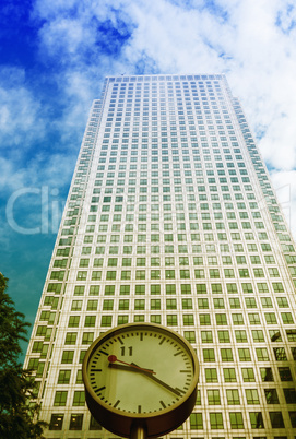 Clock and Skyscrapers at Canary Wharf, financial district in Lon