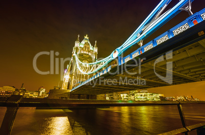 Night view of Tower Bridge from Thames riverwalk - London
