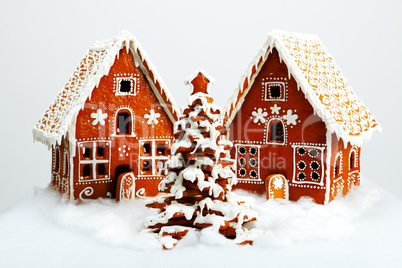 The hand-made eatable gingerbread houses and New Year Tree with