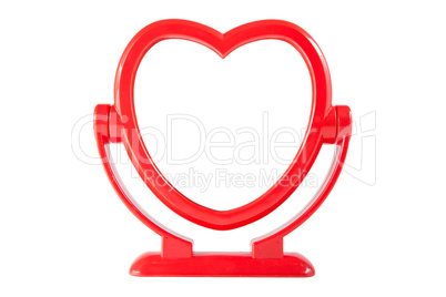 Mirror in the red heart frame isolated on white background