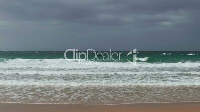 Waves Crashing on Beach, cloudy