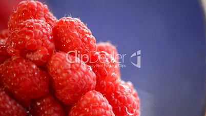 Raspberries fruit gyrating in close up