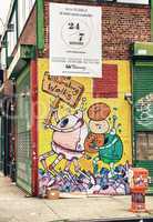 BROOKLYN - JUNE 15, 2013: Art on buildings wall. Brooklyn is fam
